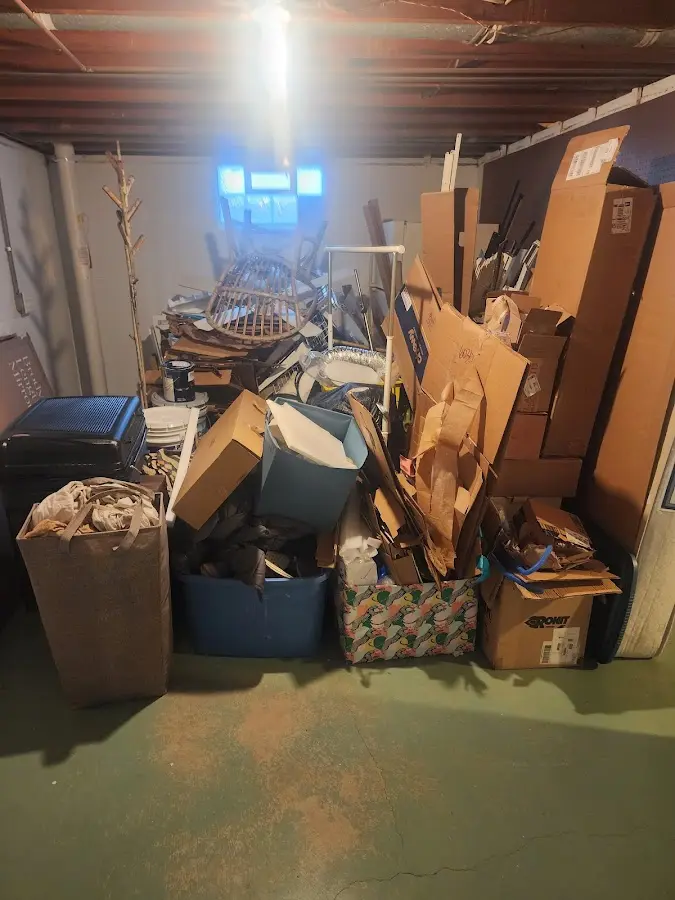 Roll-off dumpster container at job site for Construction Dumpster Rental in Newton